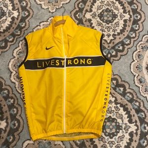 Live strong Nikes fast dry Nike biking vest. Yellow black adult small
